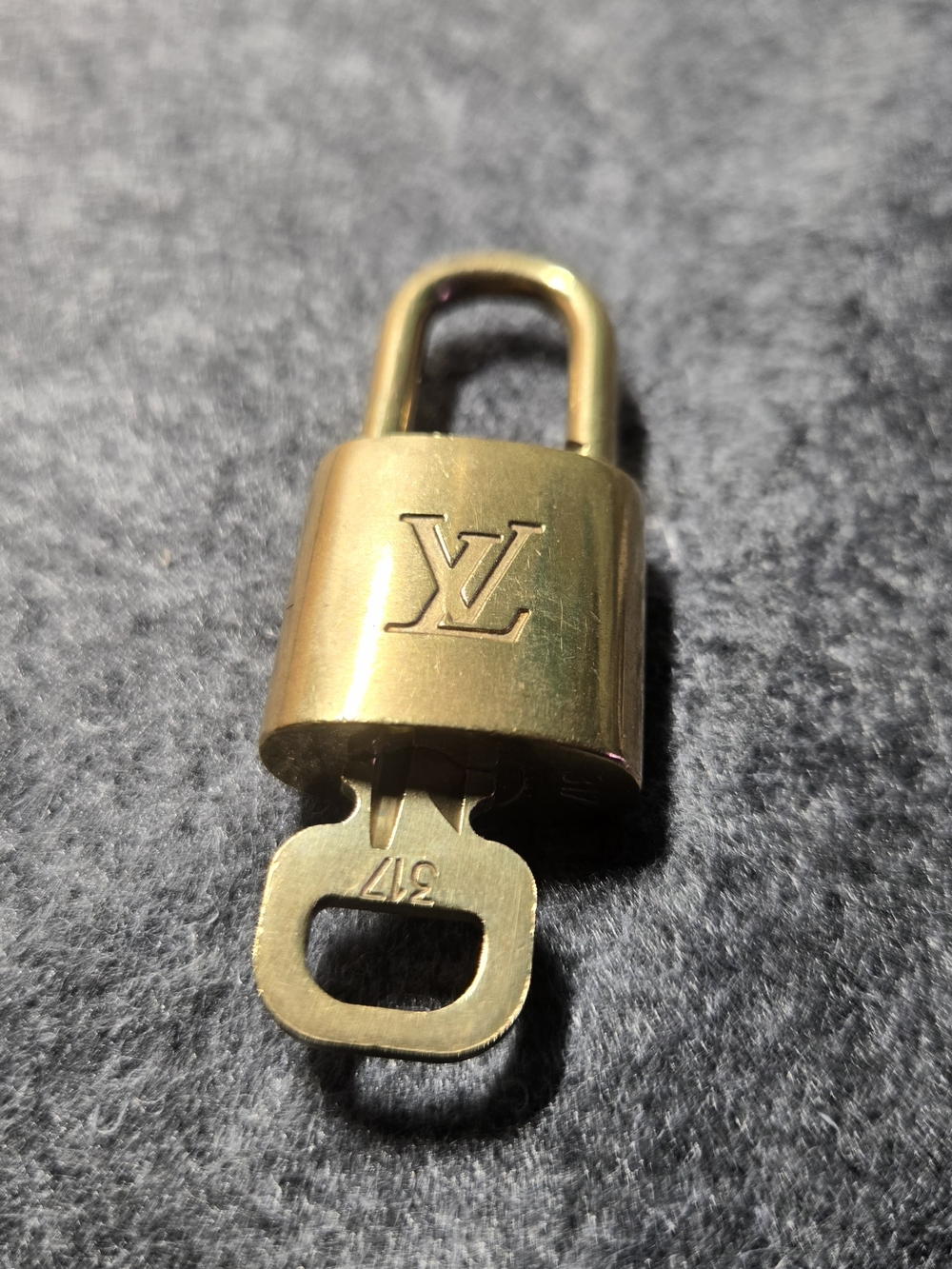 #317 Louis Vuitton Gold Padlock and Key